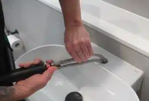 Local plumber completing a hot water system repair