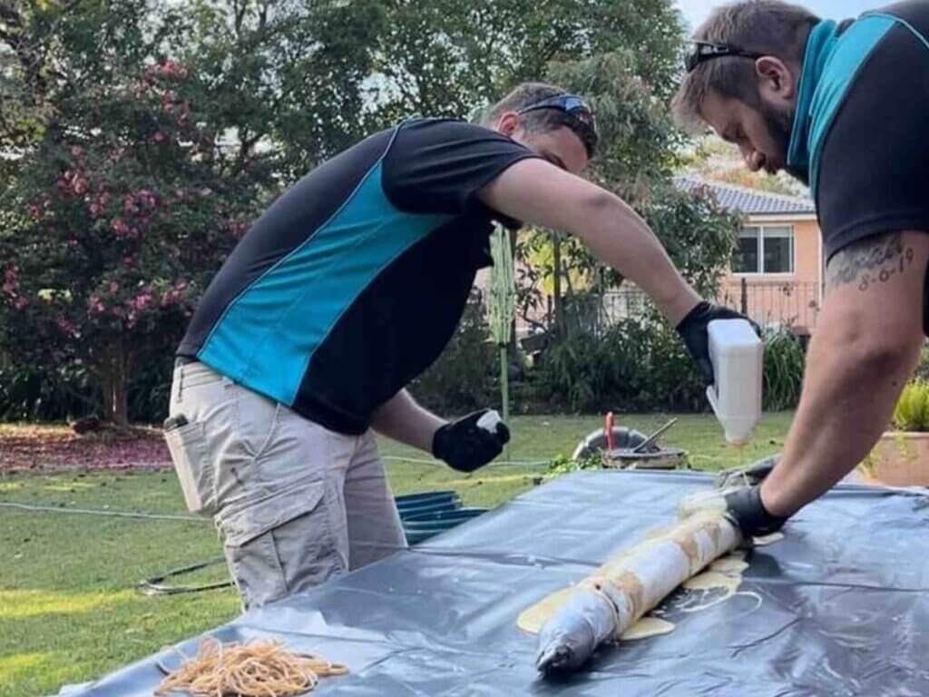 Trenchless-Pipe-Relining-Sydney-The-Clean-Plumber-14-1 (1) Professional plumbers performing trenchless pipe relining with specialised tools