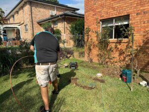 Local Plumbers preparing a pipe for trenchless pipe relining