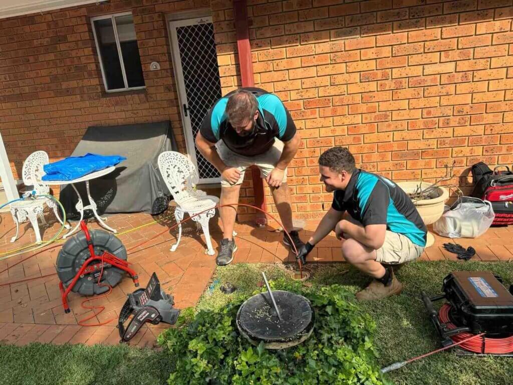 Trenchless-Pipe-Relining-Sydney-The-Clean-Plumber-9 (1) Plumbers with cameras completing an inspection